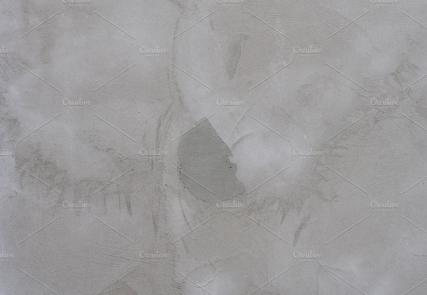 Close-up of a gray concrete wall with rough texture and irregula, a Background Photo by ndanko
