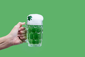 Green beer mug with foam for St. Patrick’s Day, a Food & Drink Photo by etorres69