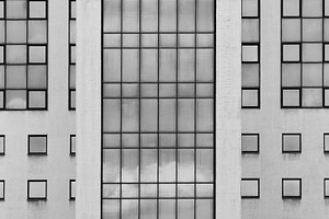 Symmetric windows of modern minimali featuring background, backdrop, and