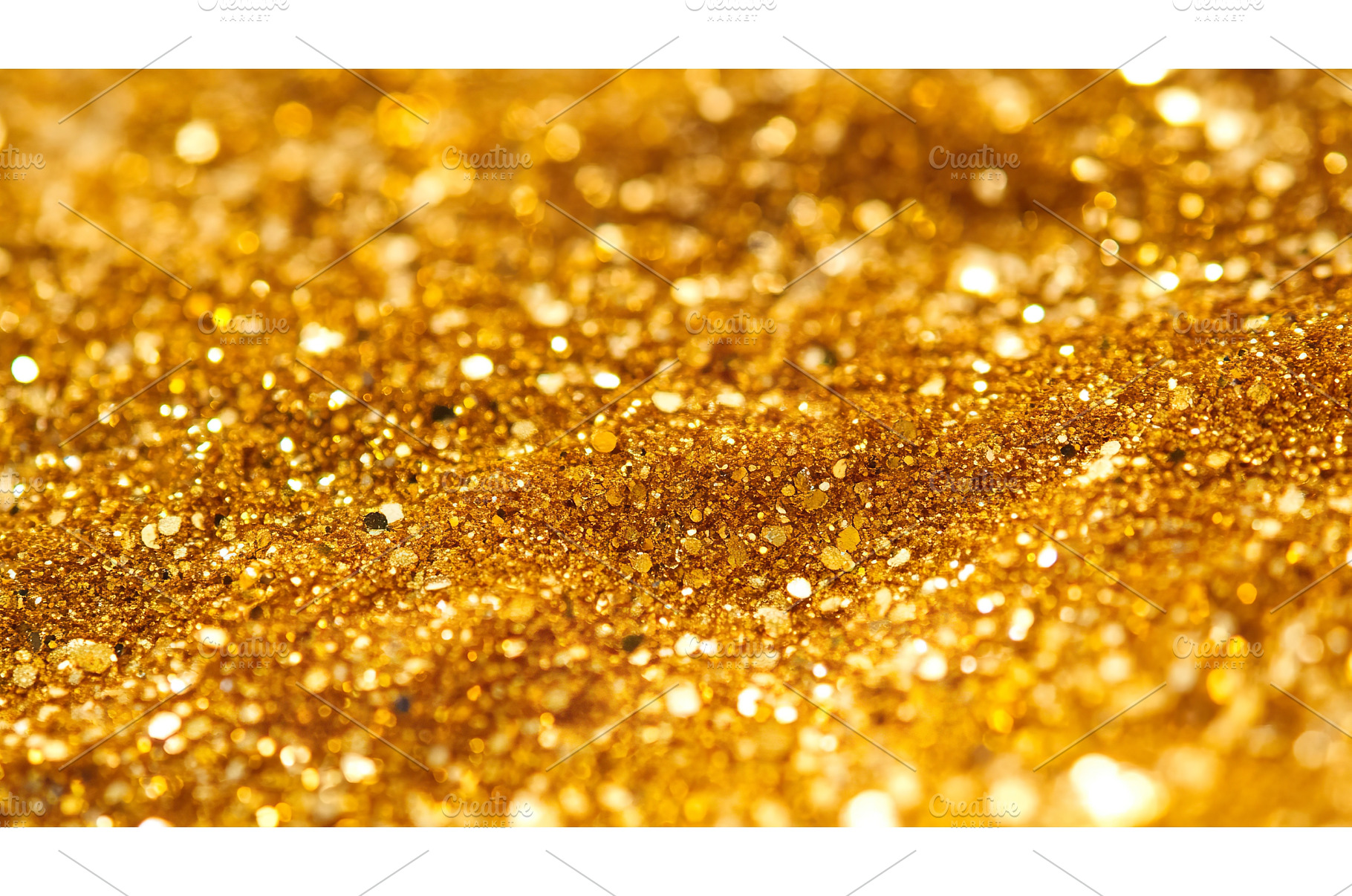 Close up of sparkling gold glitter, an Abstract Photo by Lermont51