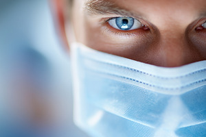 Close up of a focused surgeon’s eye, a Health & Medical Photo by MistyDay