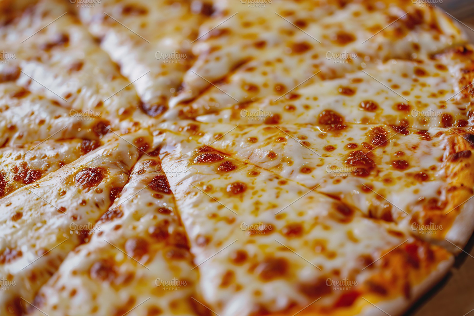 Fresh homemade cheese pizza, a Food & Drink Photo by AlyaAnd