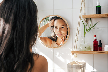 Beautiful hispanic woman looking in, a Person Photo by Yummypic