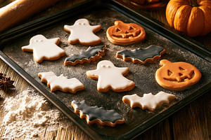 Halloween cookies shaped like ghosts bats and pumpkins, a Food & Drink Photo by José Manuel Gelpi