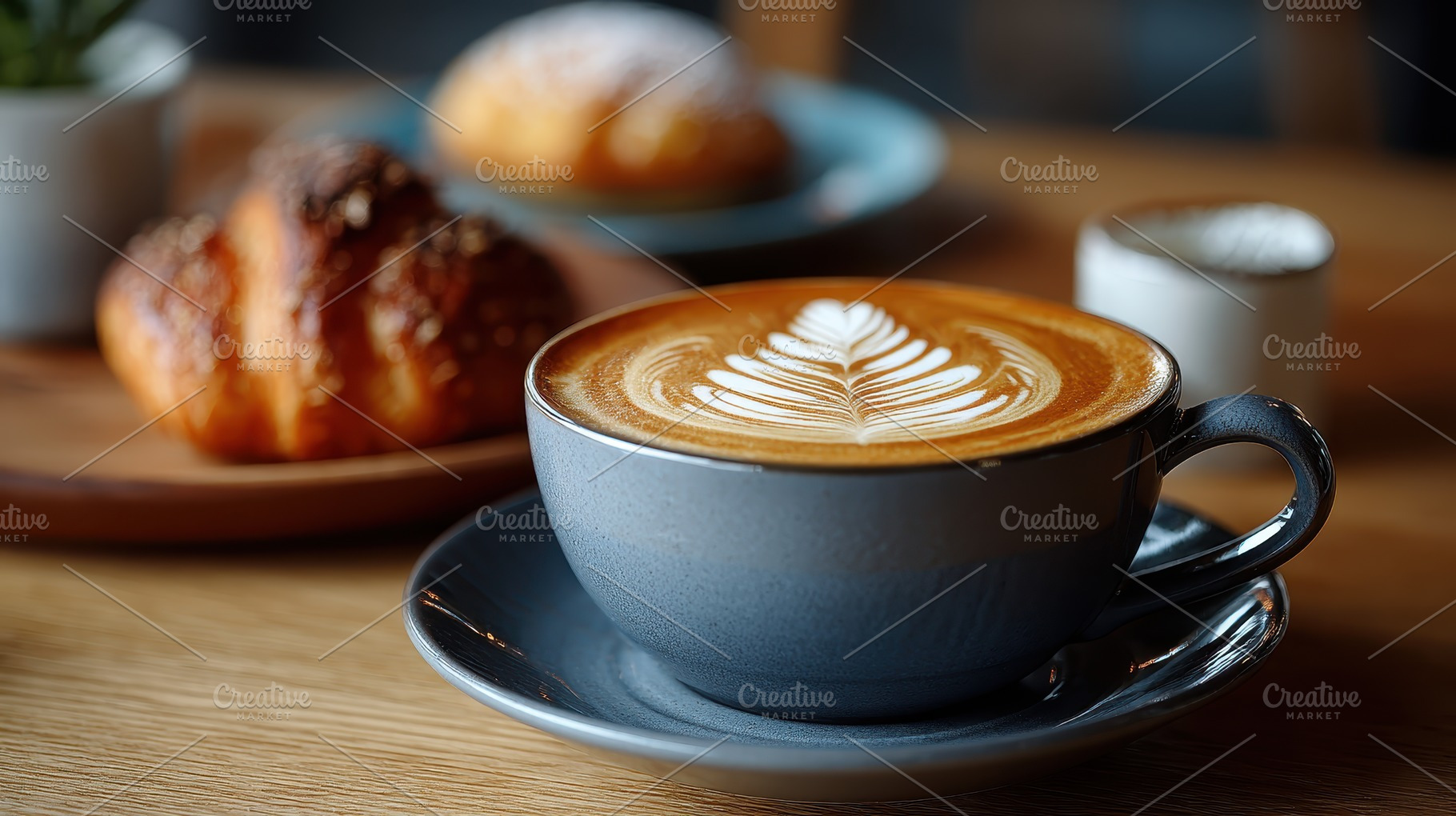 Latte art coffee and pastries breakf, a Photo by Pixeness Studio