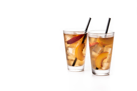 Glass of peach tea with ice cubes, a Food & Drink Photo by etorres69