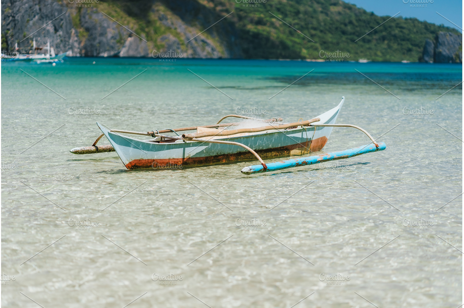 Boat on blue shallow ocean water. El, a Nature Photo by Igor Tichonow