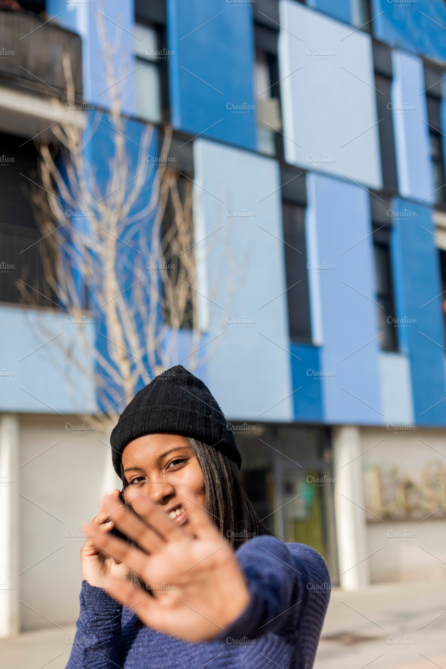 Young beautiful black woman standing, a Person Photo by 2Design