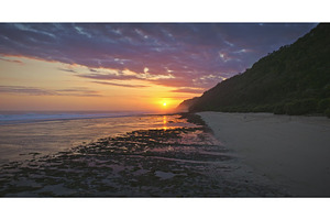 Bali sunset illuminating a beach