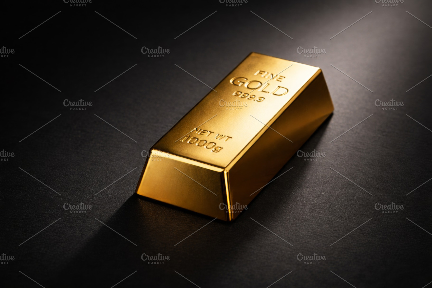Gold bar on dark surface symbolizing, a Photo by Dvoevnore photos