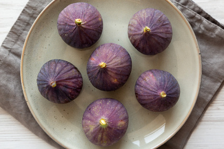 Raw Organic Figs on a Plate, top view., a Food & Drink Photo by LiudmylaChuhunova