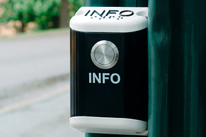a public information button outdoors, a Photo by Nito