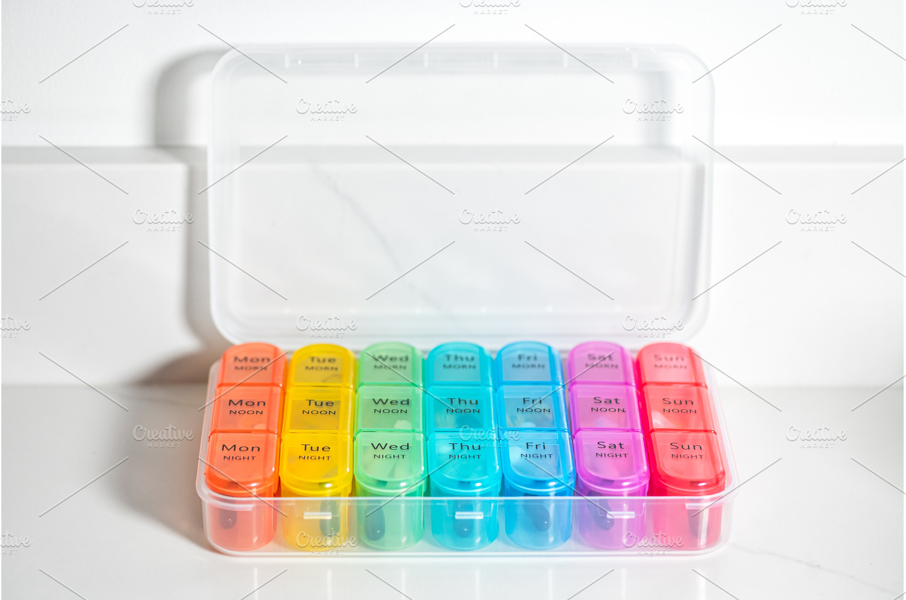 Weekly Pill Box With Vitamins, a Health & Medical Photo by MAnuta