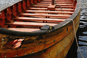 Wooden Viking Ship Anchored in a Cal, a Transportation Photo by Perpis