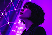 Young adult woman in a dark suit gaze upward a neural‐network, a Person Photo by DanFLCreativo (Thumbnail 2 of 2)