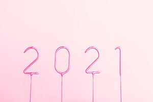 2021 New year pink numbers on pink