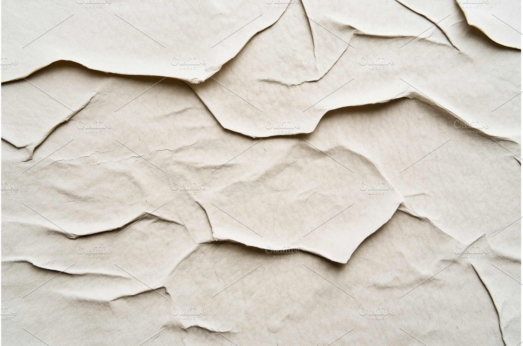 Close-up of wrinkled and torn pieces, a Background Photo by Sergey Kotenev
