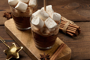 Two glasses of hot chocolate with fluffy marshmallows and a stra, a Food & Drink Photo by ndanko
