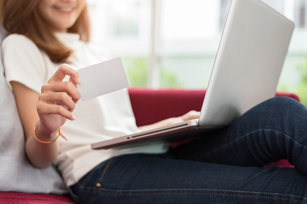 Beauty Asian woman using tablet and showing blank mock up credit, a Business Photo by Ministocker