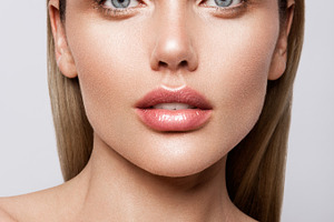 Beauty portrait of model featuring background, woman, and fashion