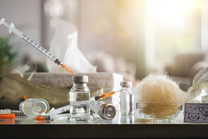 Pet allergy vaccine on table with living room in background, a Health & Medical Photo by Davizro's Market