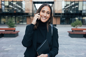 Portrait of a smiling woman employee, a Business Photo by Artem Varnitsin
