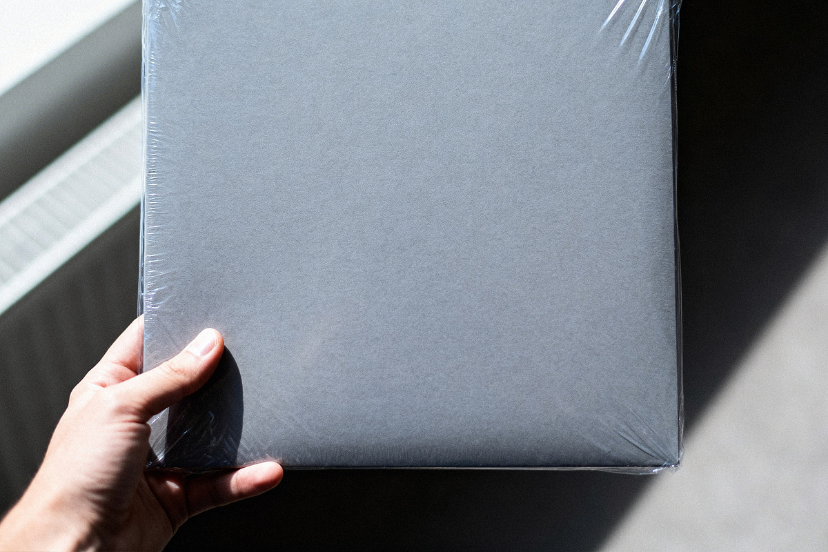Record Mockup with Plastic Wrap, a Product Mockup by Design Squad (Photo 2 of 4)