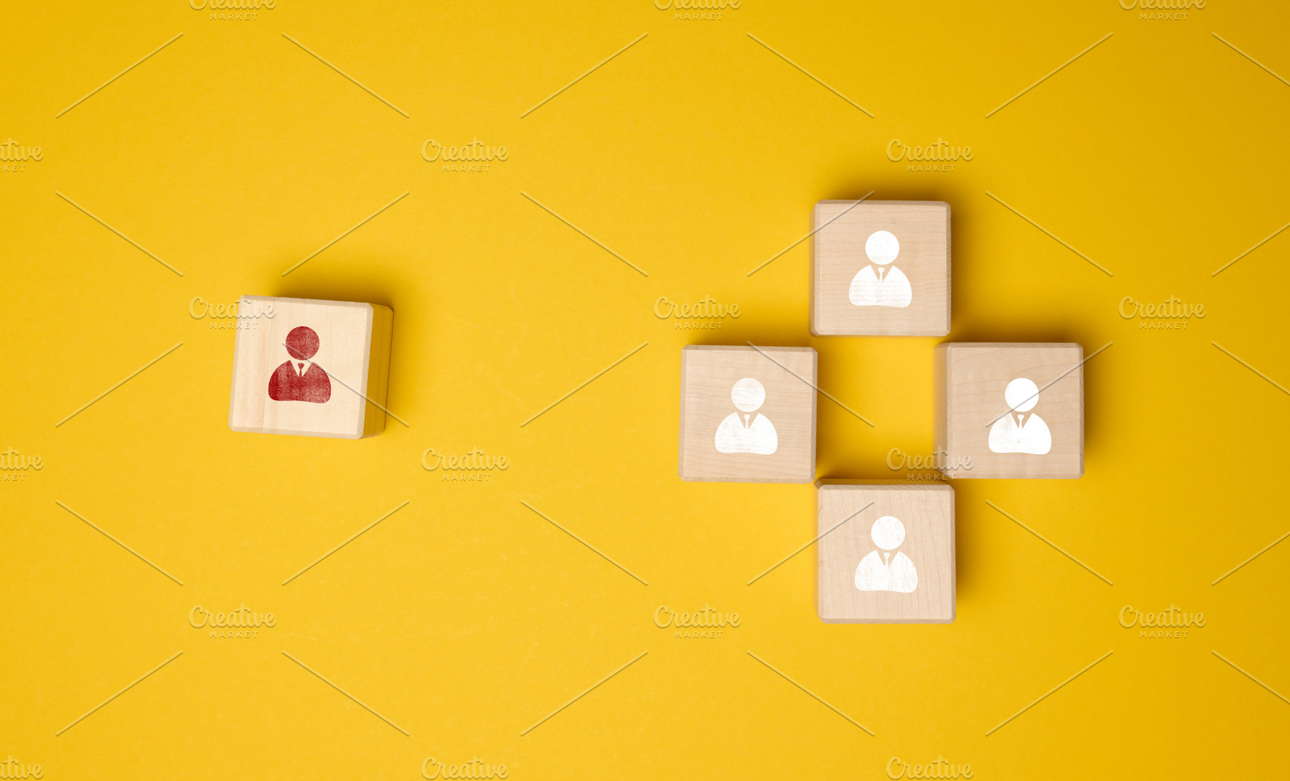 Wooden cubes with staff icons. Concepts of leadership, individua, a Business Photo by ndanko