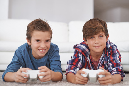 Gaming with my brother, a Photo by Peopleimages.com