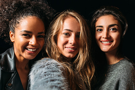 Three beautiful women taking selfie, a Person Photo by Artem Varnitsin