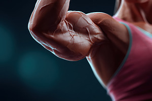 Muscular athlete showcasing impressive arm anatomy in side profile during train, a Sports & Recreation Photo by AlyaAnd