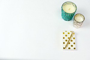 Gold white & teal desk with candle containing desk, rebecca nash photography
