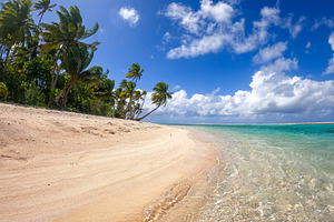 Idyllic motu on Tikehau Atoll, French Polynesia, surrounded by t, a Photo by GoodGoods