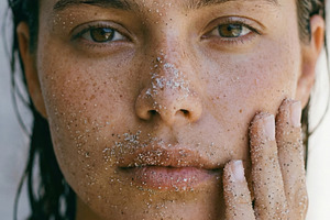 Portrait of Woman with Sand on Face, a Person Photo by Virgo Studio