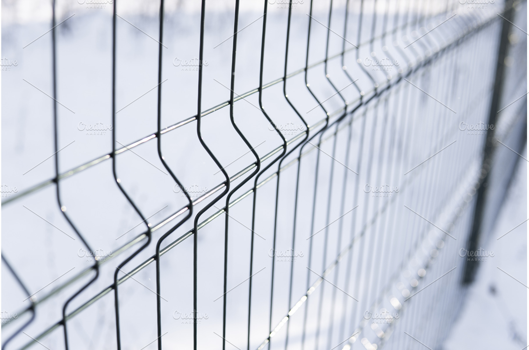 Closeup of welded metal fence with, an Industrial Photo by volodymyrshtun13795