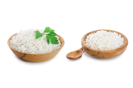 rice in a wooden bowl isolated on, a Food & Drink Photo by NataPhoto