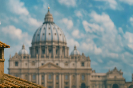 Vatican rooftop with white smoke