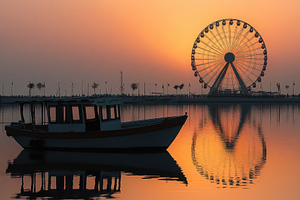 Sunset view of Al Marina with Ferris, a Photo by Iftikhar Alam