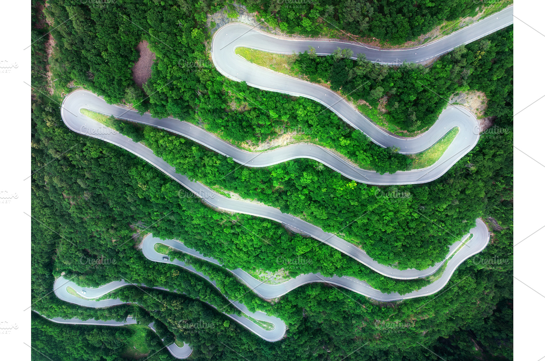 Aerial view of mountain curvy road, a Transportation Photo by den-belitsky
