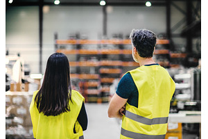 Warehouse employee in warehouse, an Industrial Photo by HalfPoint