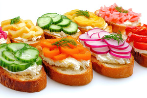 Brightly colored open-faced sandwich, a Photo by Pavel_design