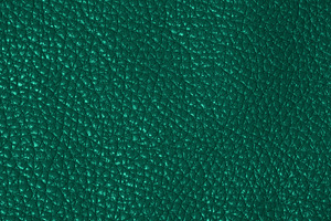 Close-up of dark green leather texture with grainy surface, a Background Photo by ndanko
