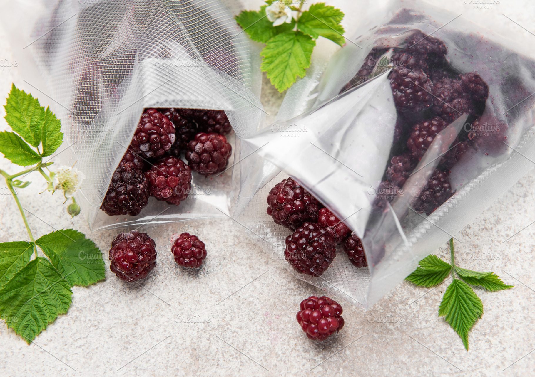 Frozen blackberries in vacuum bags for food preservation, a Food & Drink Photo by Olena Rudo