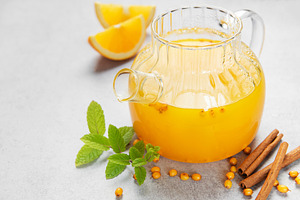 Hot sea buckthorn tea with orange mint cinnamon, a Food & Drink Photo by Olena Rudo