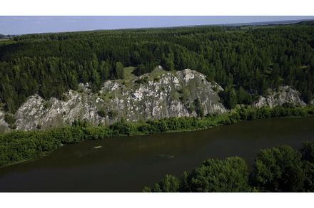 Aerial view of wild nature with rock, a Nature Photo by Media Whale Stock