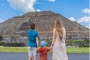 Mother with her two sons as tourists, an Architecture Photo by Elizaveta Galitskaya