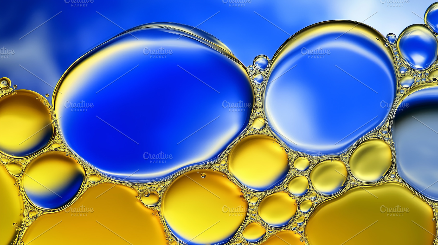 Large blue and yellow bubbles, an Abstract Photo by Imaginarium