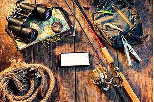 Fishing tackle on a wooden, a Sports & Recreation Photo by Stockphoto by vzwer