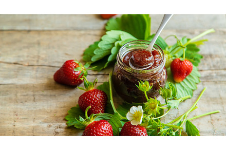 Homemade strawberry jam in a jar, a Food & Drink Photo by yanadjana