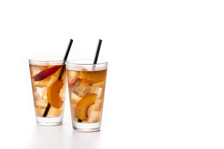 Glass of peach tea with ice cubes, a Food & Drink Photo by etorres69